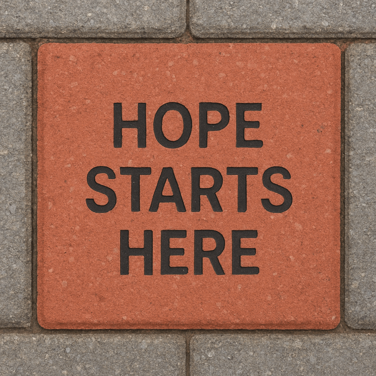 Hope starts here sign on brick wall symbolizing recovery and hope at Montana's leading addiction treatment center.